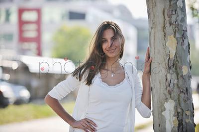 beautiful young woman have fun and relax at city street on beautiful sunny day