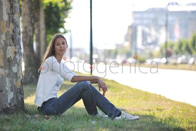 beautiful young woman have fun and relax at city street on beautiful sunny day
