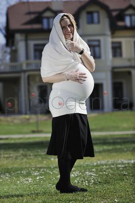happy young pregnant womant have fun outdoor in nature at sunny day