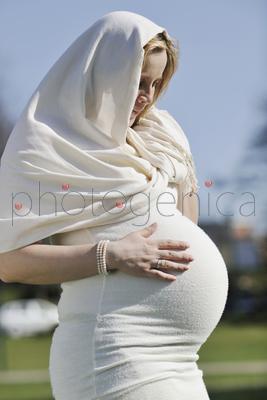 happy young pregnant womant have fun outdoor in nature at sunny day