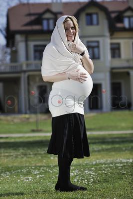happy young pregnant womant have fun outdoor in nature at sunny day