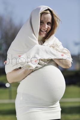 happy young pregnant womant have fun outdoor in nature at sunny day
