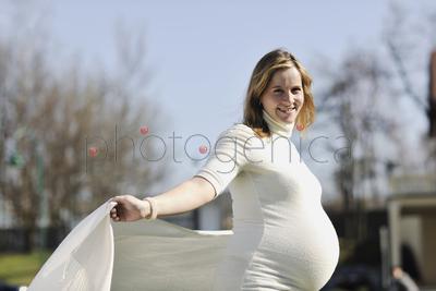 happy young pregnant womant have fun outdoor in nature at sunny day